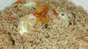 Préparer du riz à la sardine